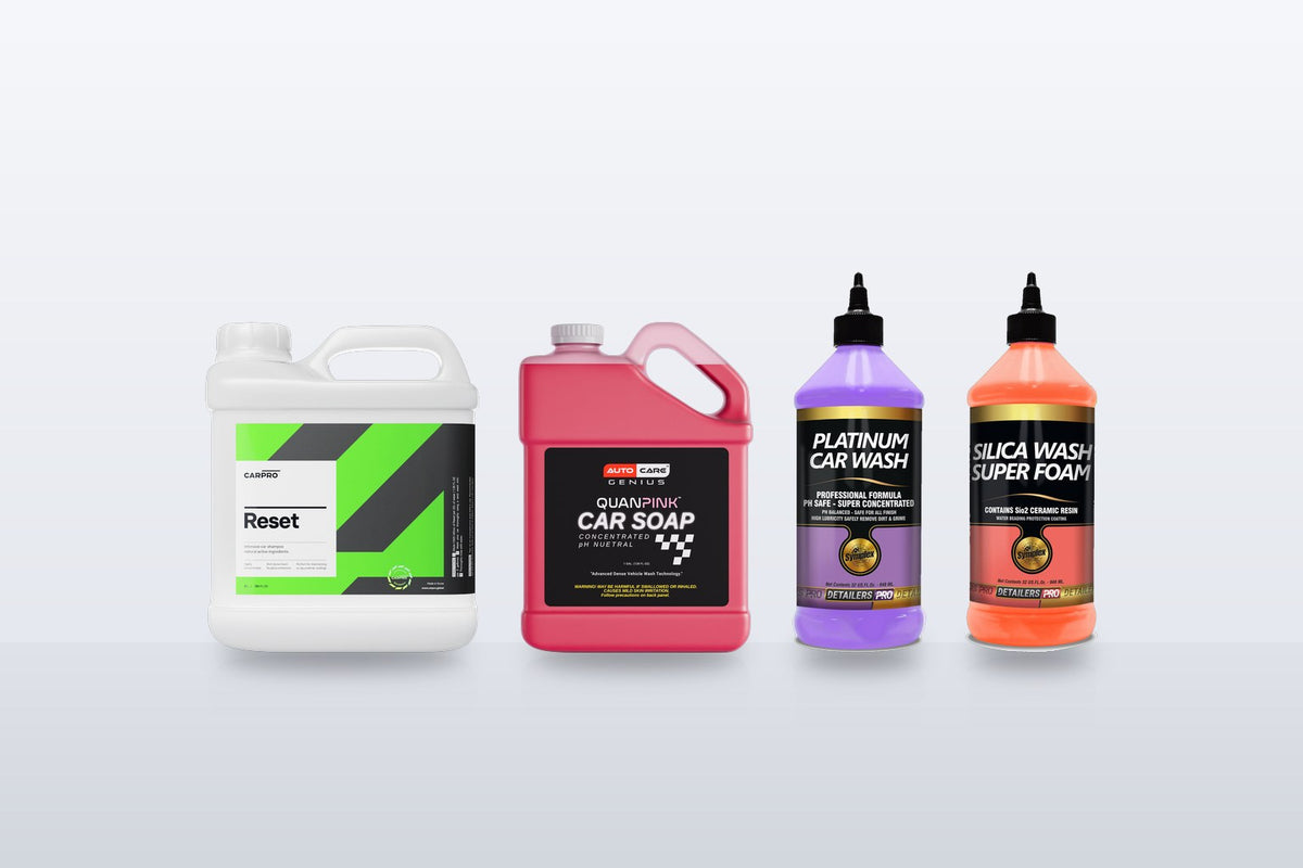CarPro Reset gallon next to Quan Pink Car Soap gallon, Symplex Platinum Car Wash and Symplex Silica Wash