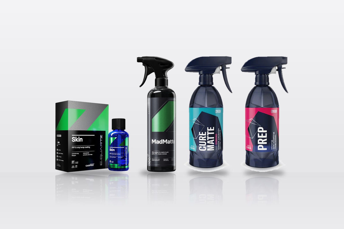 CarPro CQuartz Skin kit, CarPro MadMatte, Gyeon Q²M Cure Matte and Gyeon Q²M Prep bottles in a row